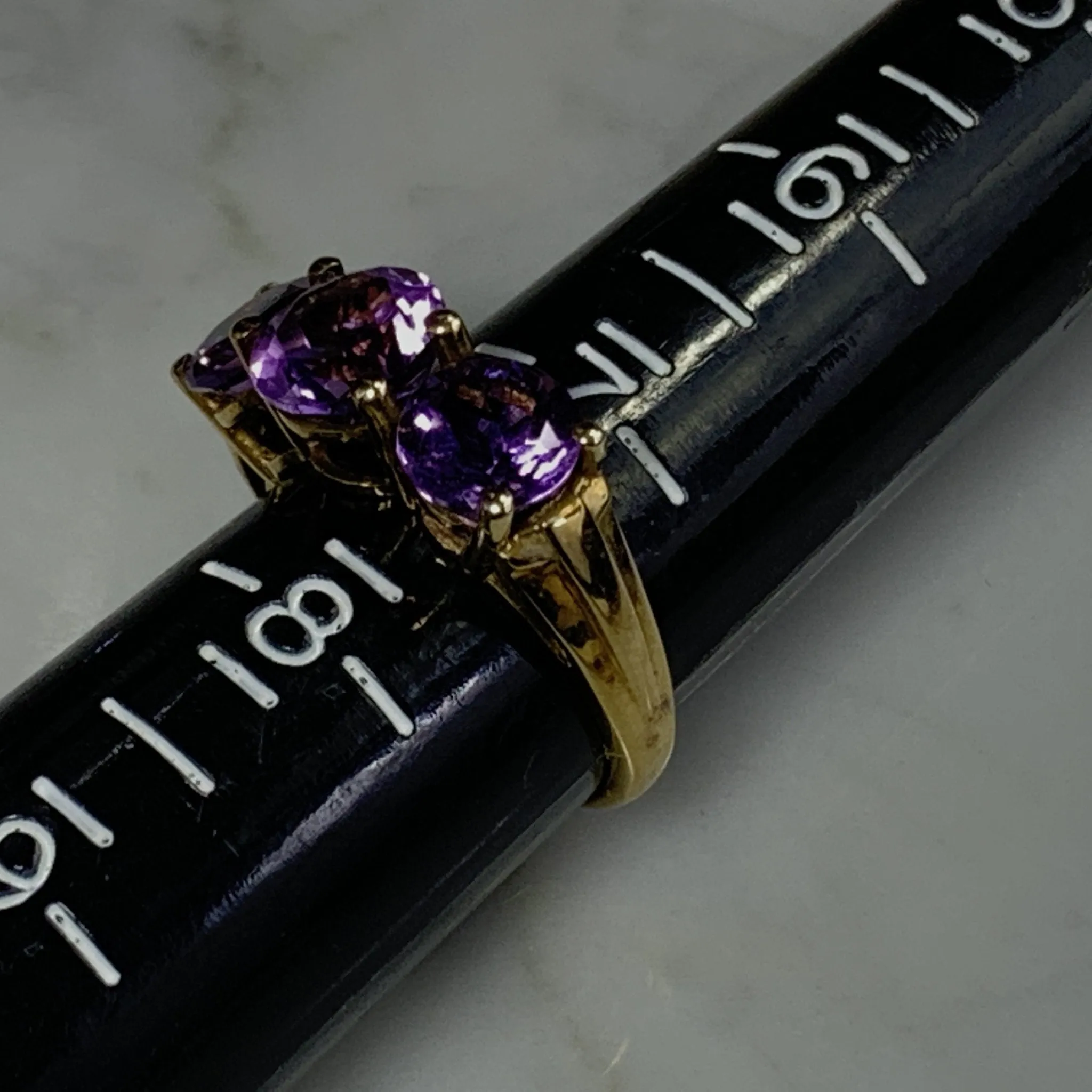 1970s Amethyst Ring with Three Bright Purple Gemstones set in Yellow Gold. February Birthstone.