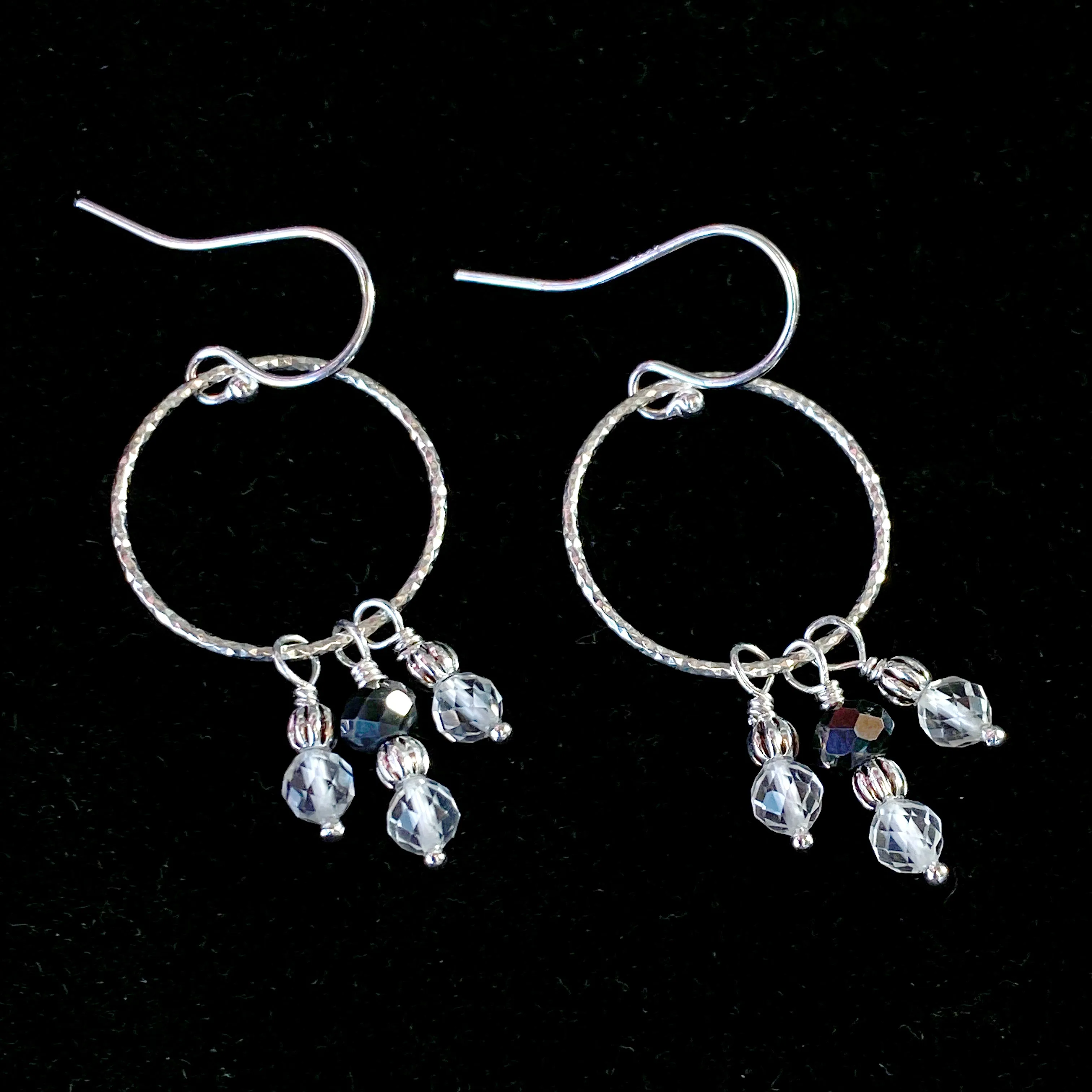 Black diamond, white topaz gemstones, and and sterling silver dangle earrings