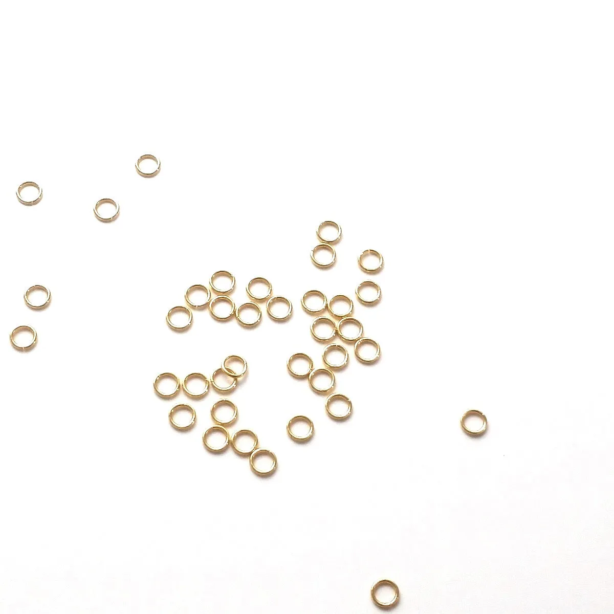 Gold Stainless Jump Rings, 4x0.6mm, 2.8mm Inside Diameter, 23 gauge, Closed Unsoldered, Lot Size 100