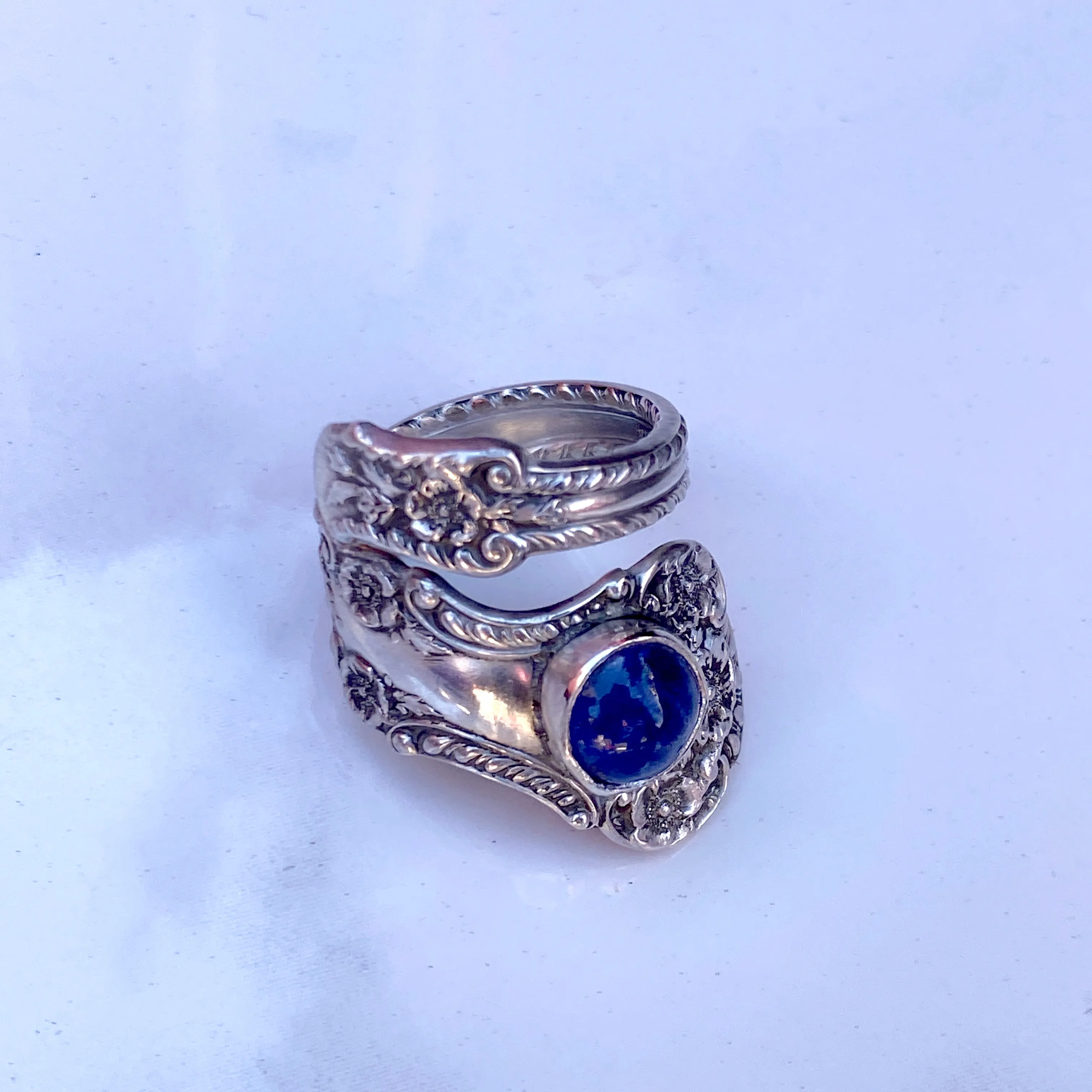 Vintage Sterling Silver Spoon Ring with Tanzanite gemstones.