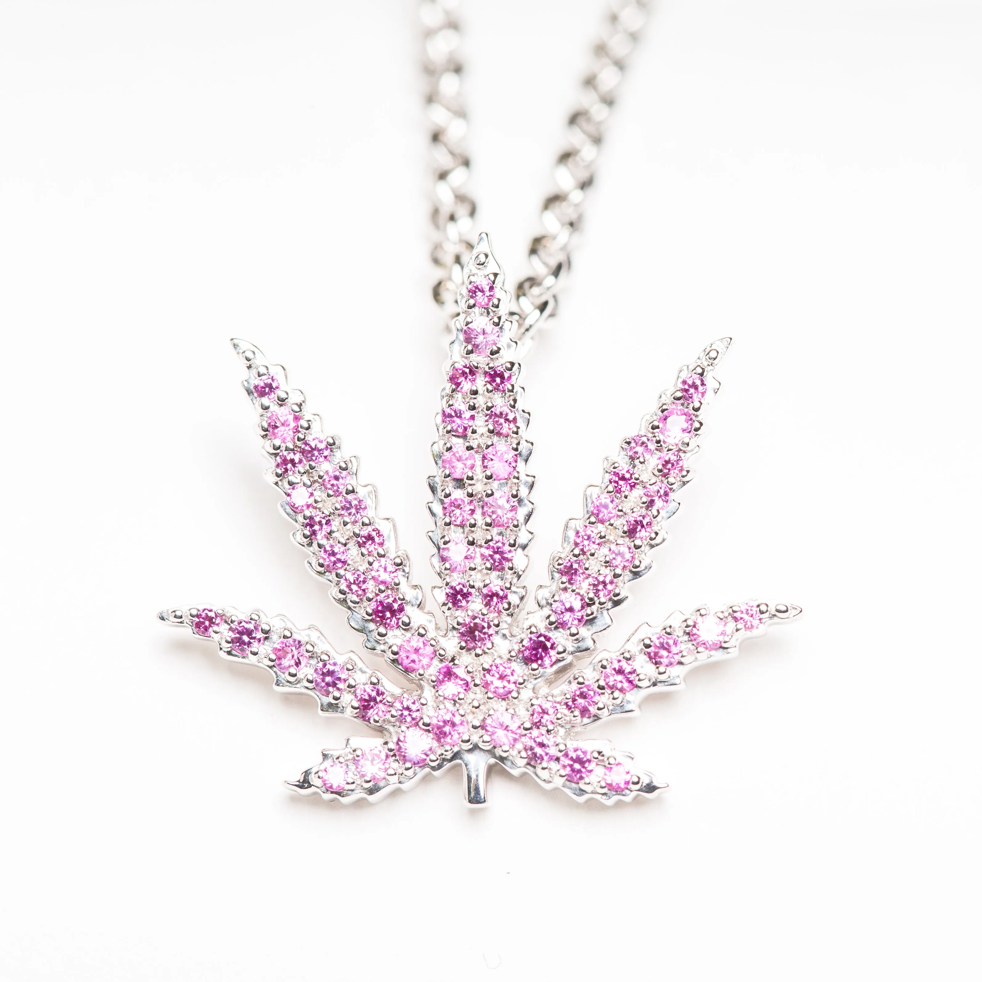 White Gold Sativa Leaf Pendant with Pink Sapphire Gemstones